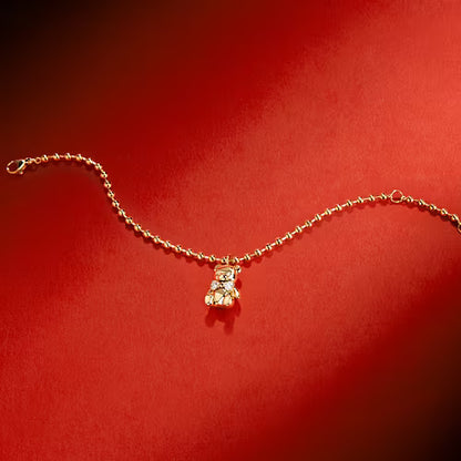 Bracciale Donna GCDS Coraggio Bear in Acciaio Dorato e Cristalli Bianchi